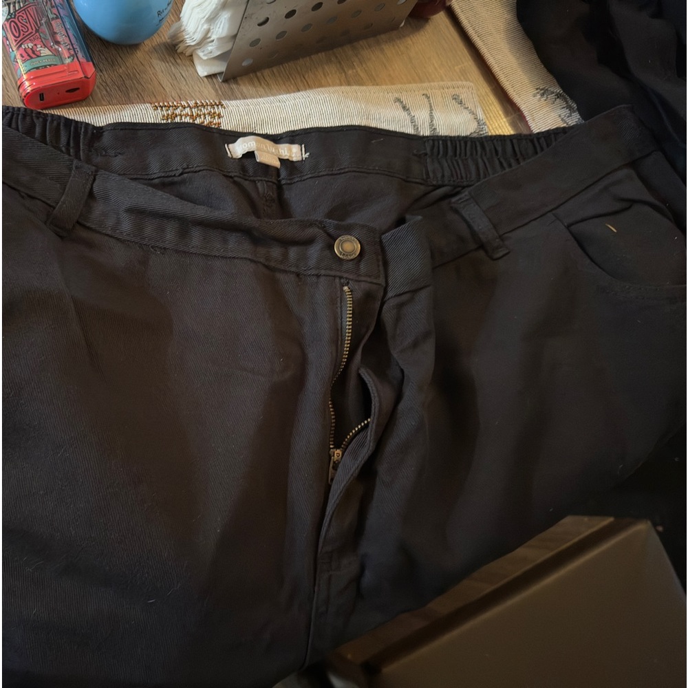 These jeans are NWOT 28 T with elastic back.